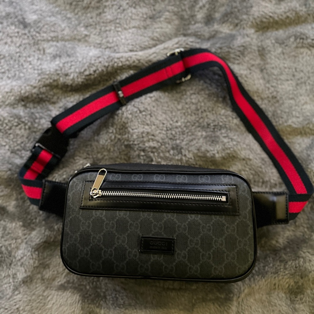 Gucci Black Belt Bag with Bold Red Strap